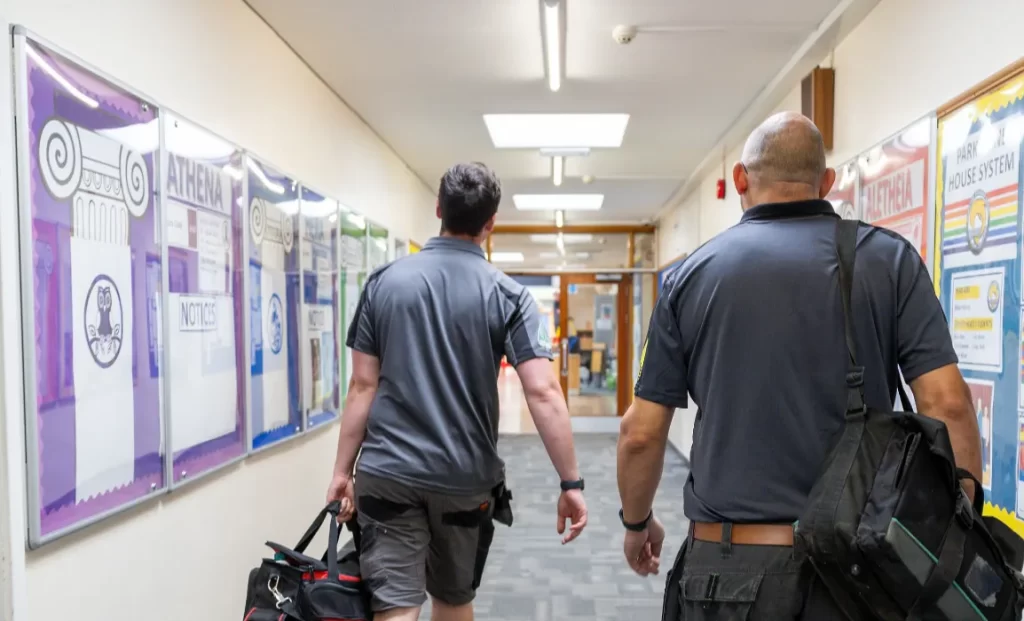 Asbury Walking into a School