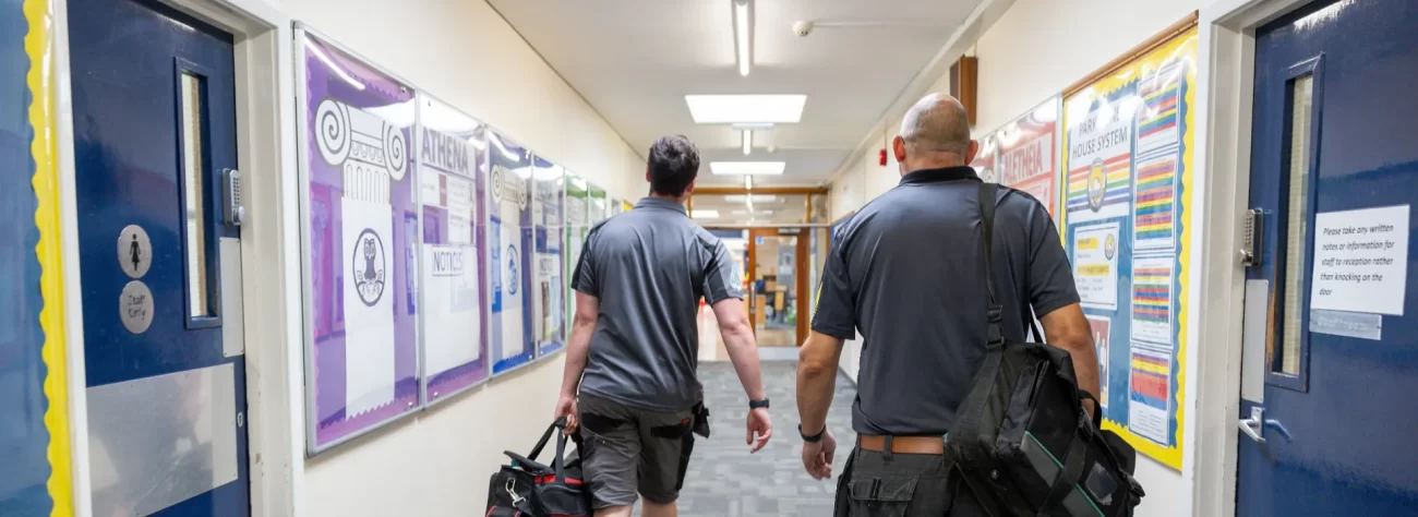 Asbury Walking into a School