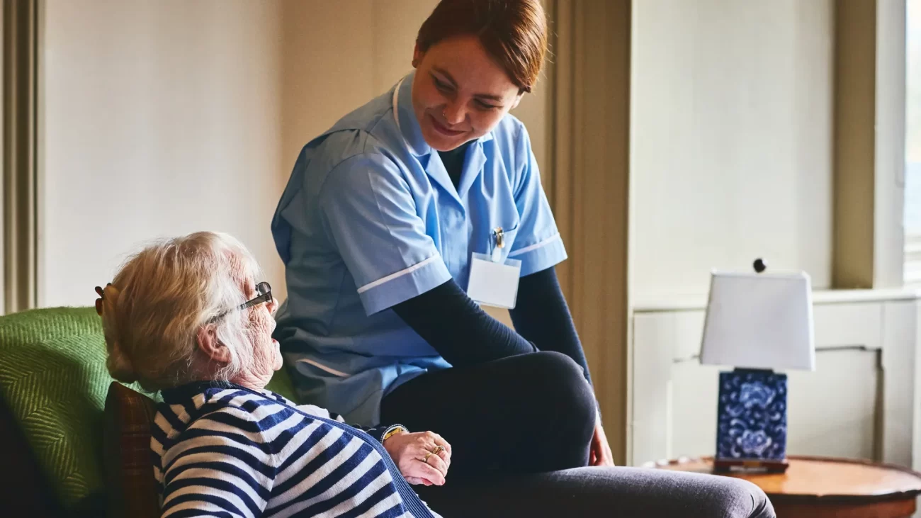 Care Home Resident and Carer Talking