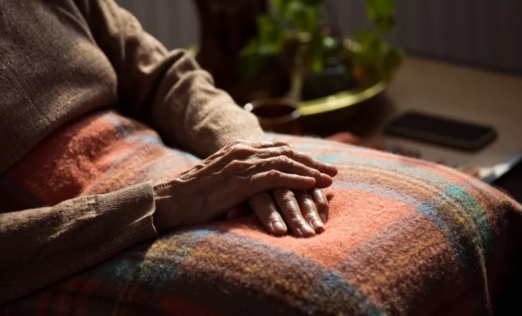 Elderly Person with a Blanket
